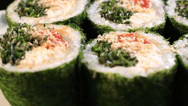 Aged kimchi and seaweed rolls with fresh vegetables