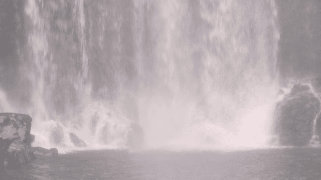 Majestic waterfall cascading down rocks