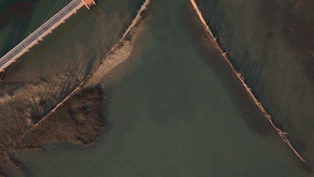 Aerial view of a fish farm on a calm sea