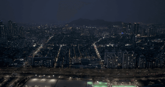 Night view of a bustling city with lights