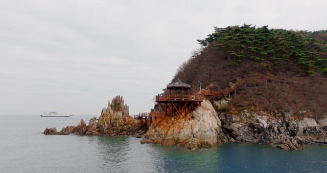 Coastal Walkway with Rocky Peaks