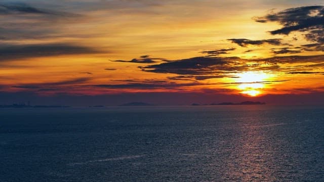 Sunset Horizon over Calm Seascape