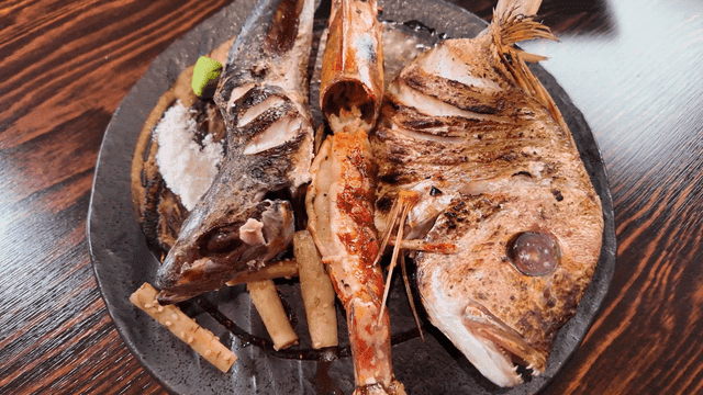 Plate of grilled seafood with salt