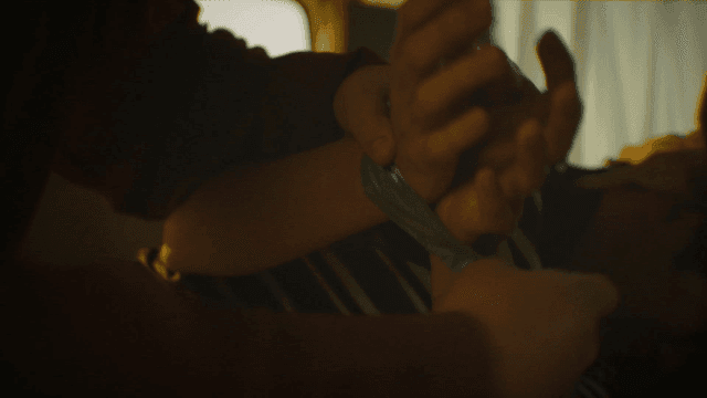 Person with both hands tied with tape