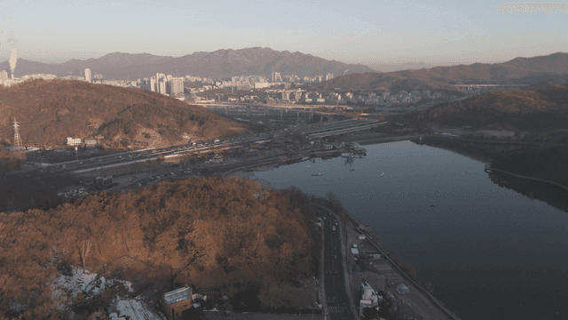 Cityscape with roads and lakes