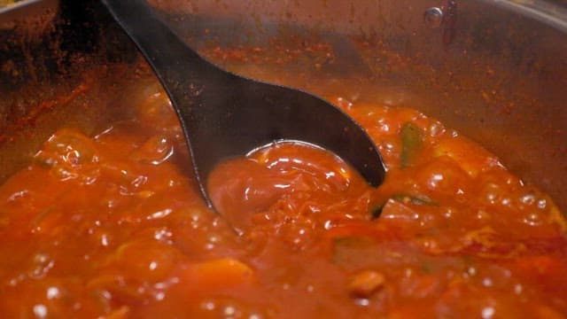 Kimchi stew boiling in a pot