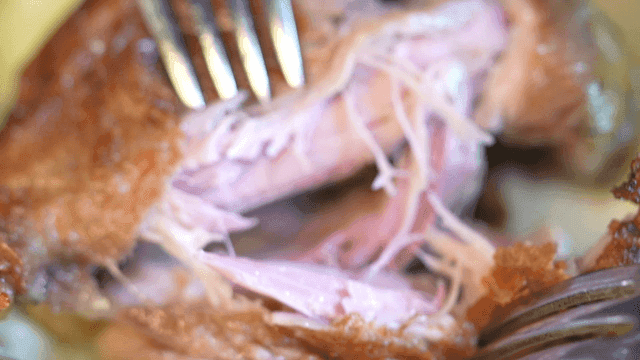 Juicy roasted duck confit that can be cut with fork