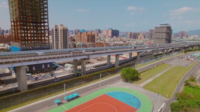 Cityscape with elevated highway and river