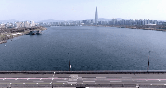A river with a city skyline in the background