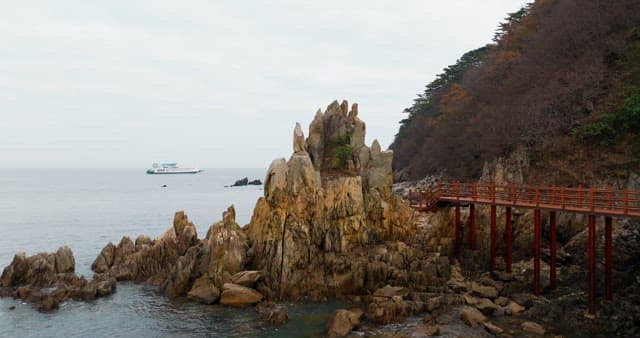 Coastal Walkway with Views of Rocky Peaks