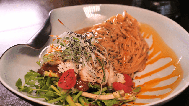 Fresh vegetable salad and pasta