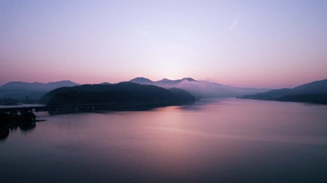 Serene Sunrise over a Tranquil River