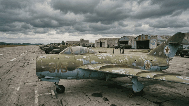 Old North Korean military aircraft at airfield