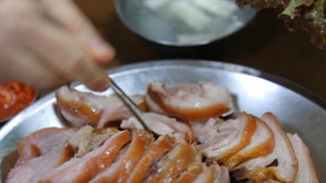 Person who puts pig's feet and wraps lettuce wrap