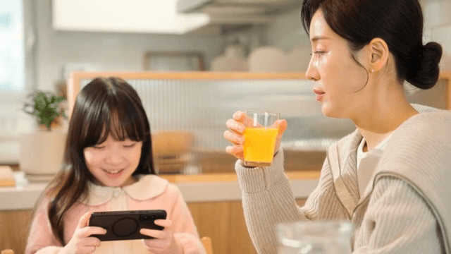 Mother talking to a child who is only on her phone