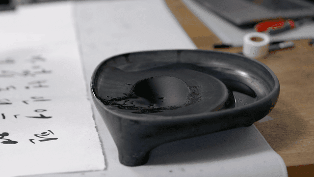Traditional inkstone and calligraphy