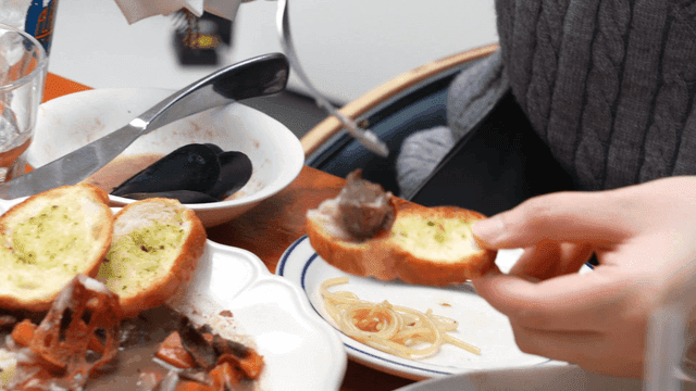 Meal with bread and stew on table