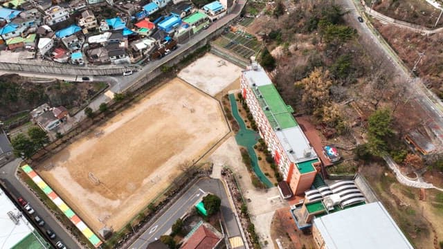 Aerial view of a school and surrounding area