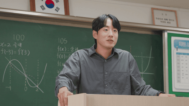 Teacher giving a lecture in a classroom