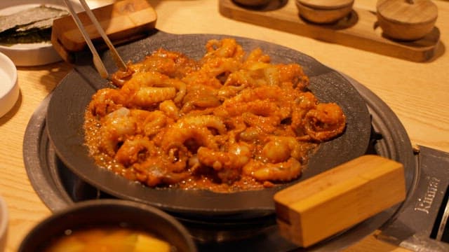 Sizzling Octopus Dish on Hot Iron Plate