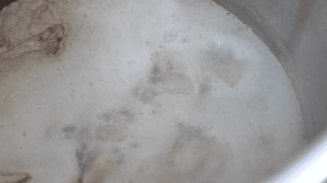 Boiling broth in a large pot
