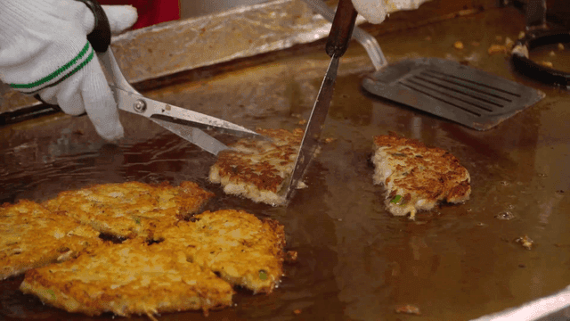 Mung bean pancakes fried on hot iron plate