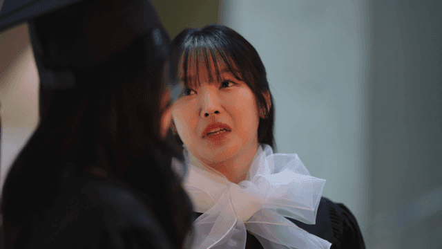 Graduates having conversation