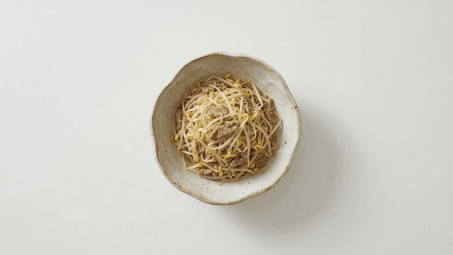 Bowl of stir-fried bean sprouts and beef