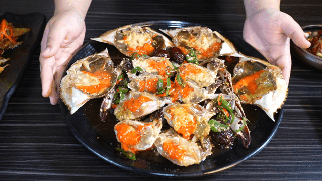 Plate of soy sauce marinated crab