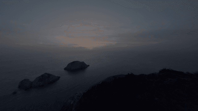 멀리 보이는 섬과 바다 위의 일몰