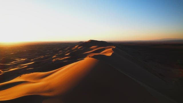 Serene Sunset over Desert Dunes