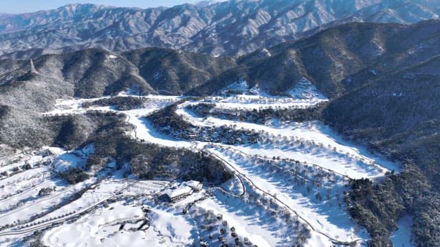 Snow-Covered Mountain Landscape from Above