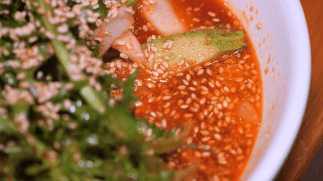 Bowl of spicy cold bibim noodles