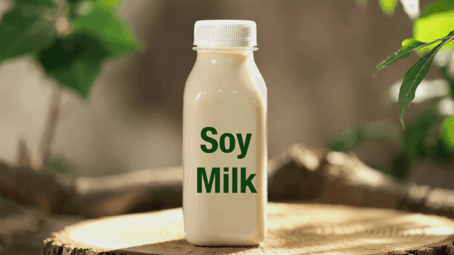 Soy milk bottle on a wooden surface