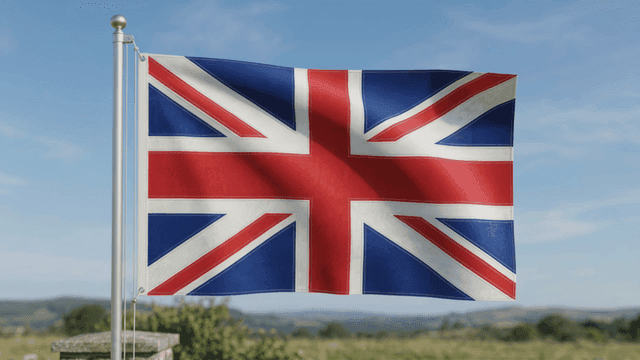 Union Jack British flag fluttering in countryside