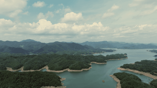 Vast lake surrounded by lush mountains