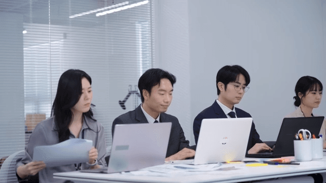 Business meeting with laptops in an office