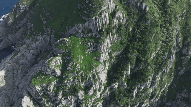 A rocky island surrounded by ocean