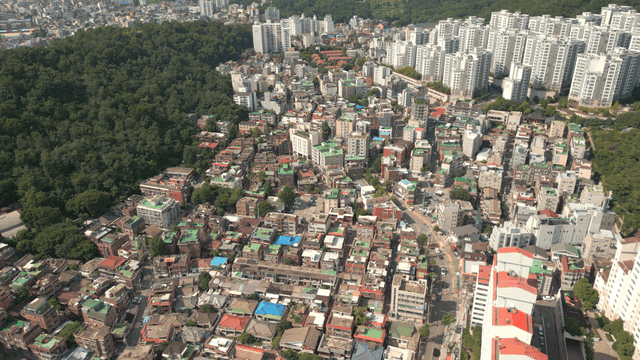 Aerial view of a city with dense buildings