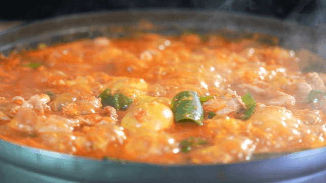 Spicy chicken offal soup in hot pot