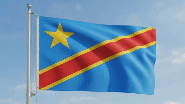 Flag of Democratic Republic of Congo fluttering under clear sky