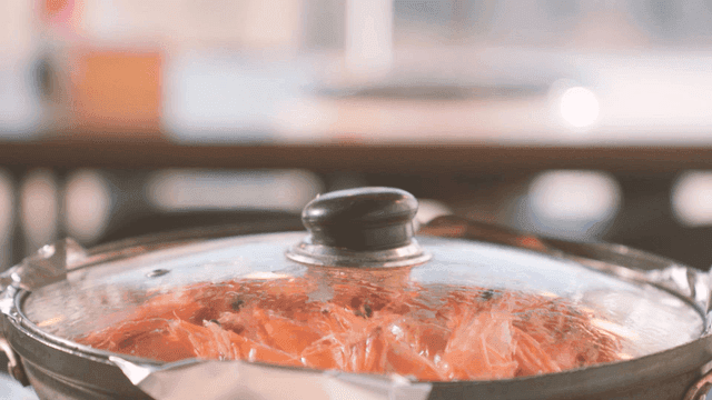 Grilled shrimp in boiling pot