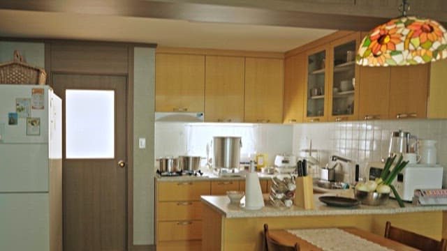 Homely kitchen scene with boiling pot