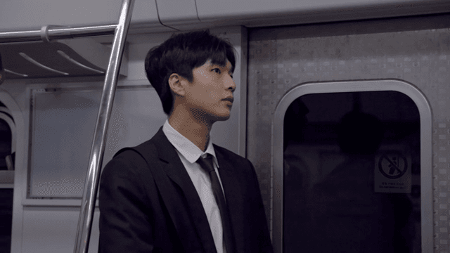 Office worker male riding the subway