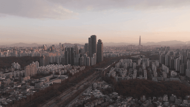 City view with tall buildings.