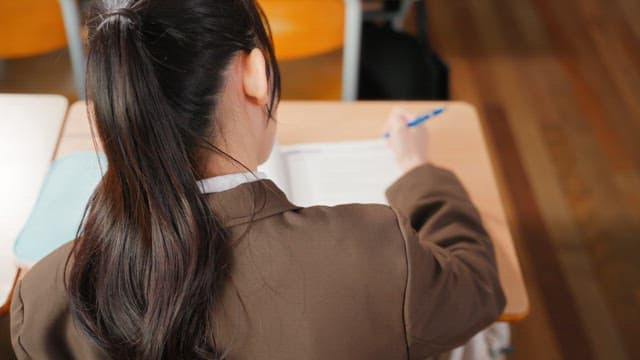 Student studying in a classroom