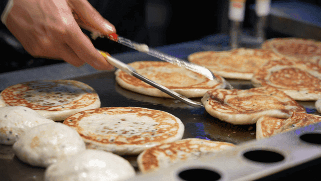 Hotteoks cooked on iron plate