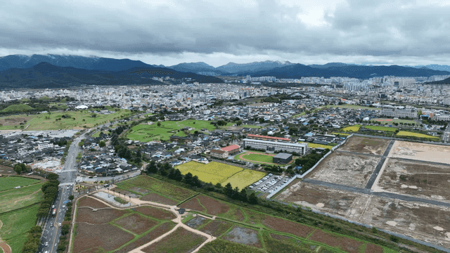 City with wide open fields
