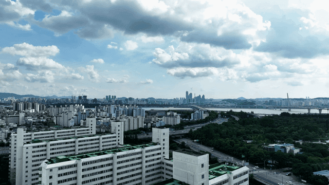 Wide city view overlooking river