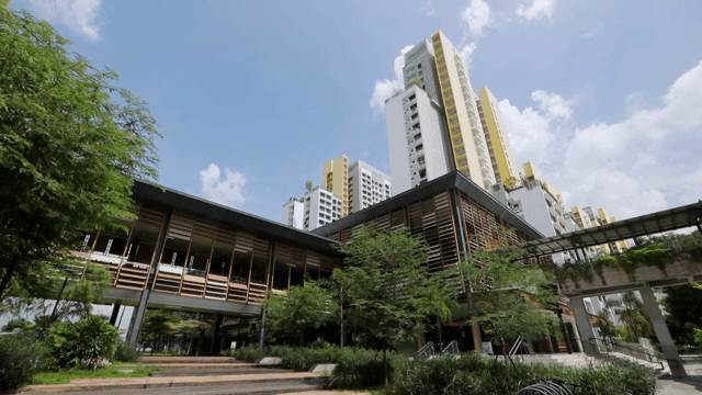 Modern buildings surrounded by greenery